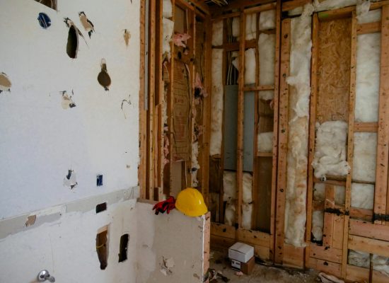 An interior space undergoing reconstruction and demolition for renovation.
